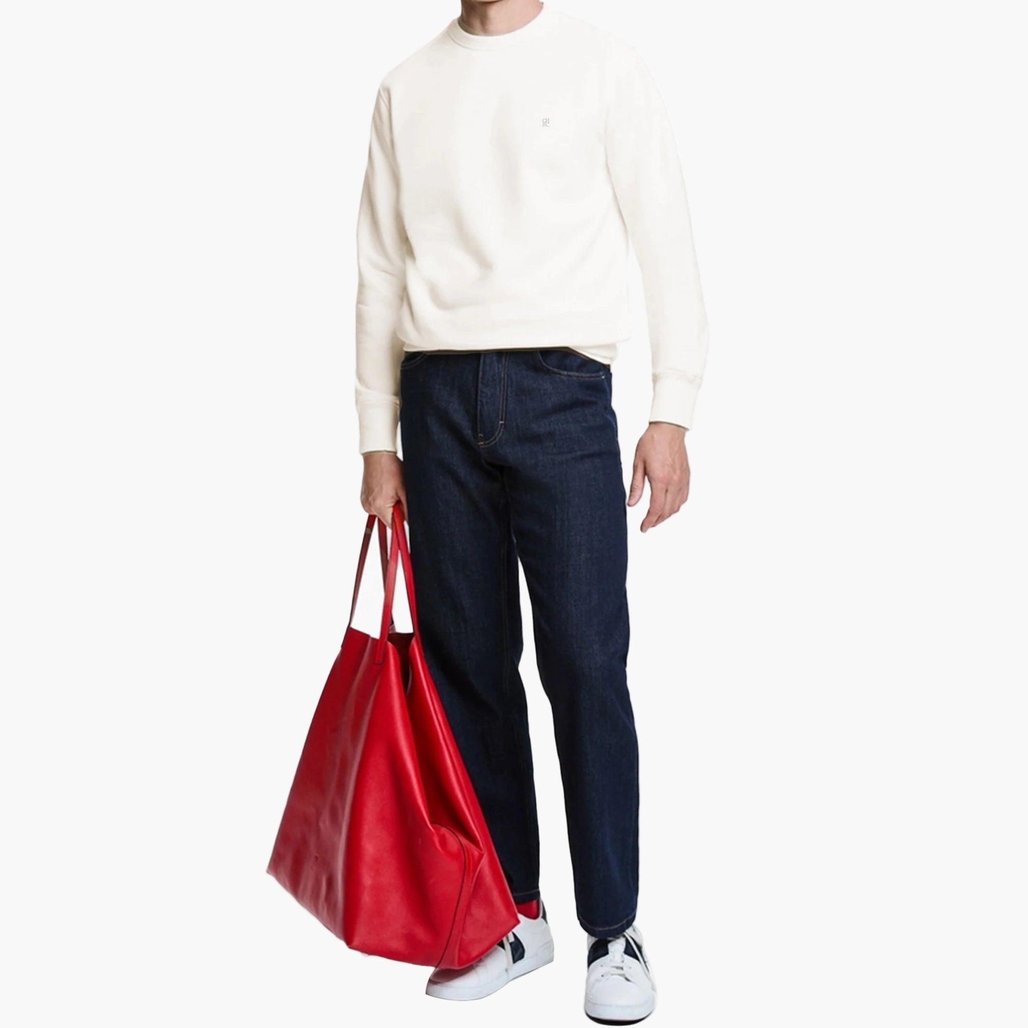 Person holding a red bag with a white background