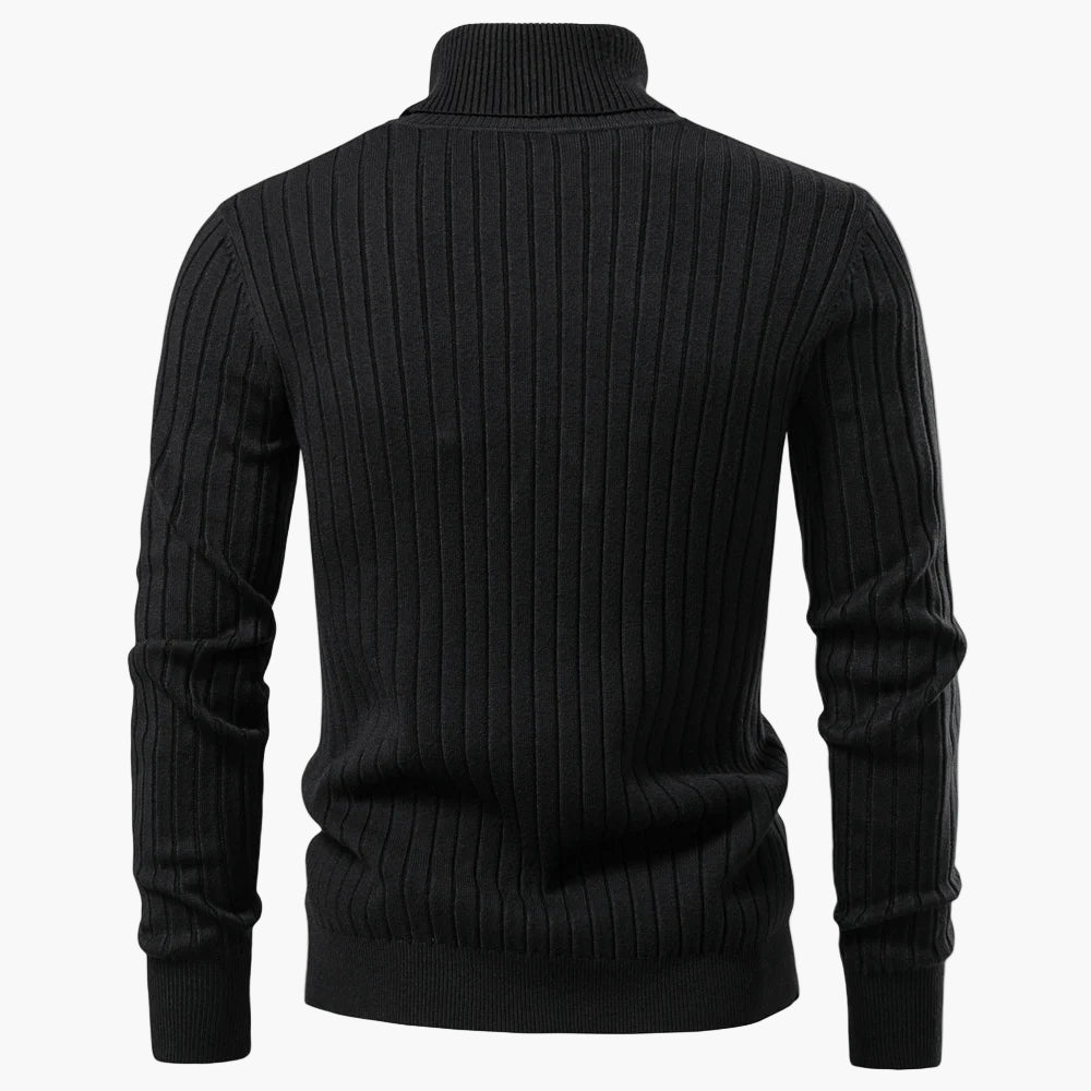 Black ribbed sweater on a white background