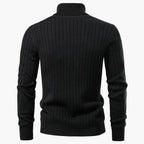 Black ribbed sweater on a white background