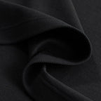 Close-up of black fabric with a textured pattern