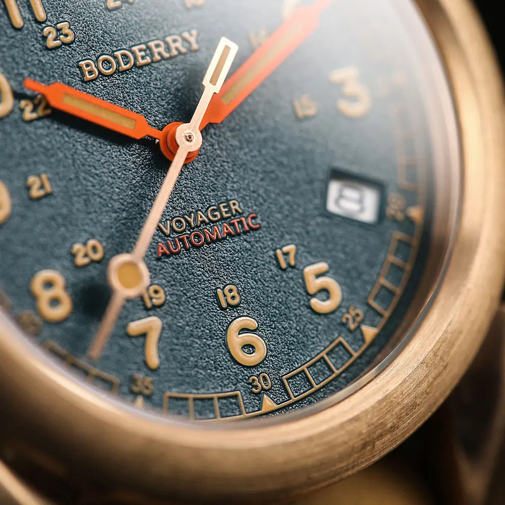 Close-up of a watch face with 'Boderry Voyager Automatic' branding.