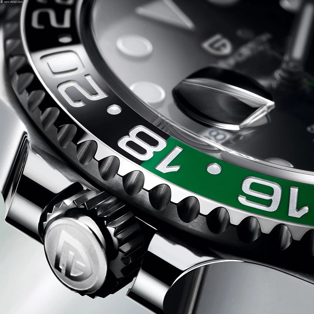 Close-up of a Rolex watch with green bezel and silver accents.