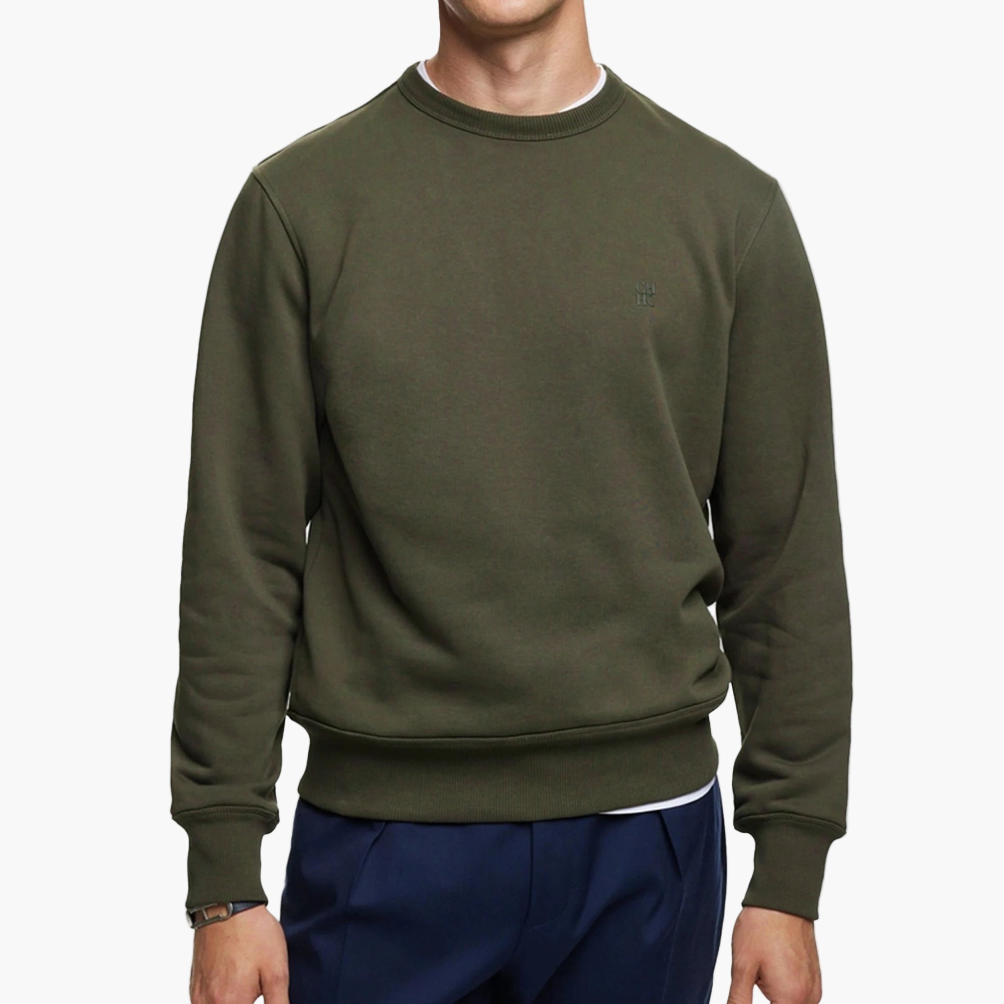 Person wearing a green sweatshirt on a white background