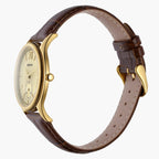 Watch with brown leather strap and gold casing on a white background