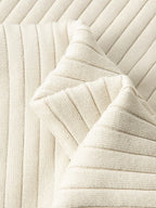Close-up of the textured ribbed fabric on the Altivieri knit polo.