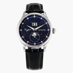 Watch with black leather strap and starry face on a white background