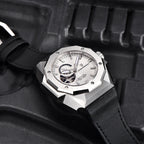 Luxury watch with a black strap on a textured black background