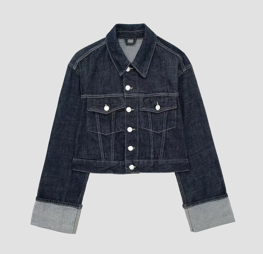 Denim jacket with button details on a white background