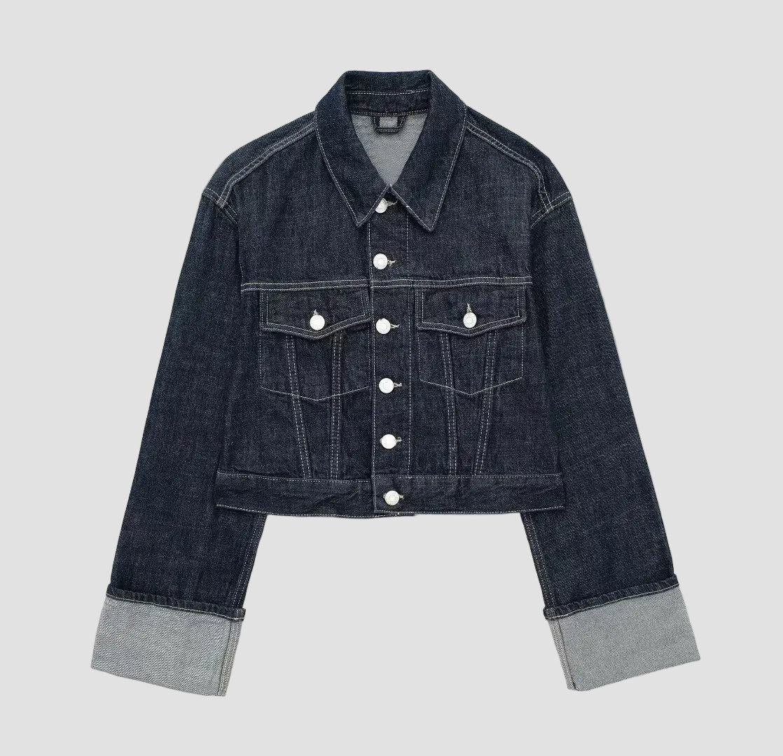 Denim jacket with button details on a white background