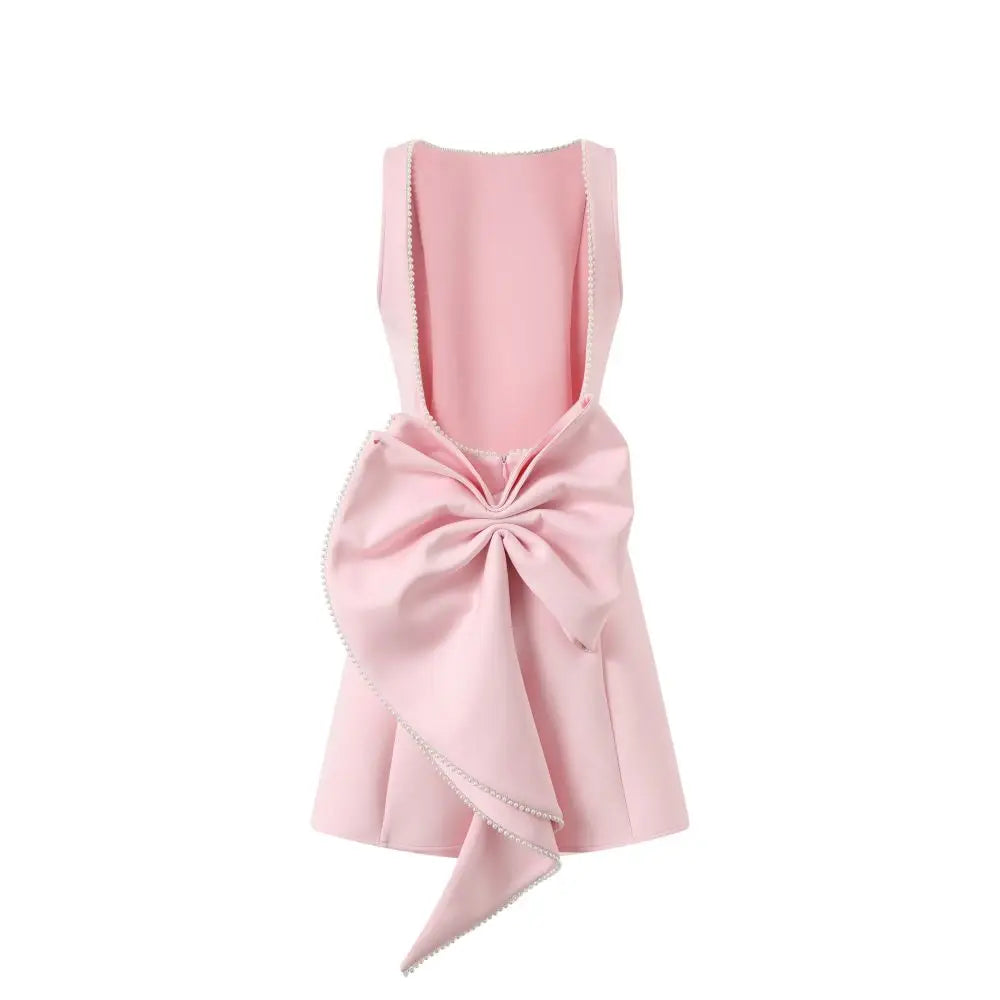 Pink apron with a large bow on a white background