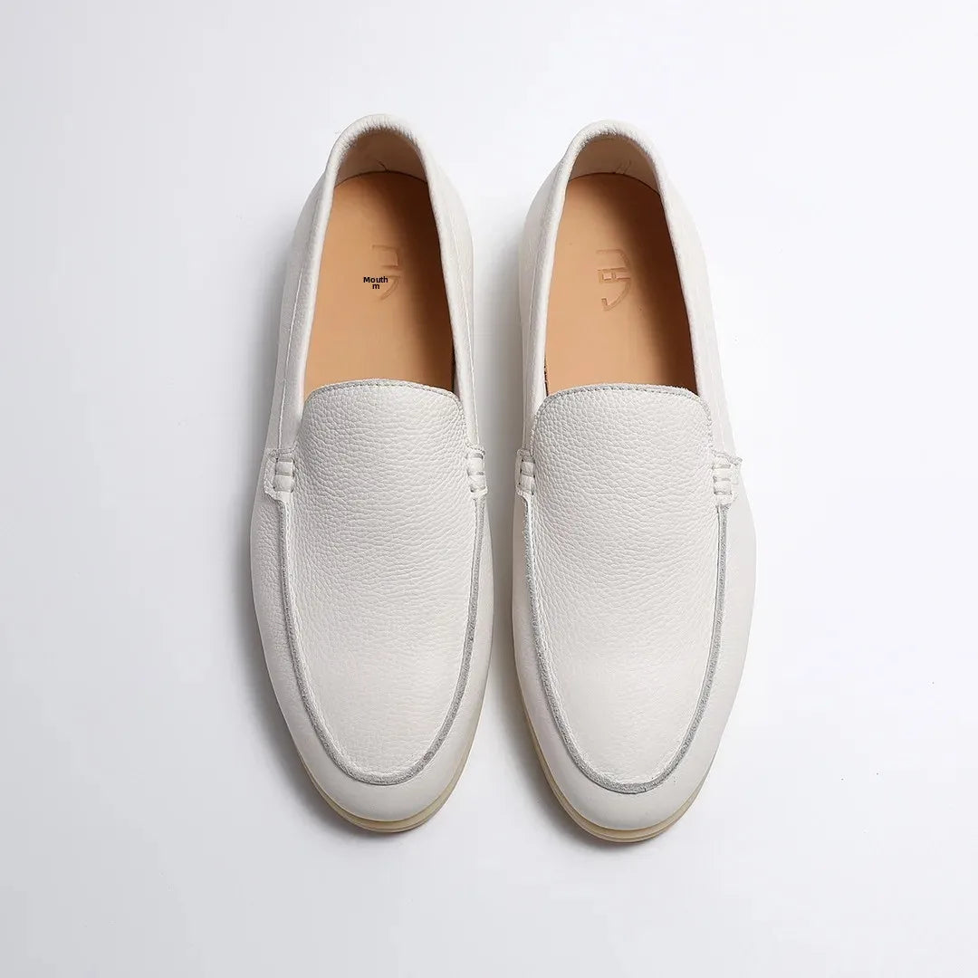 White loafers on a light gray background