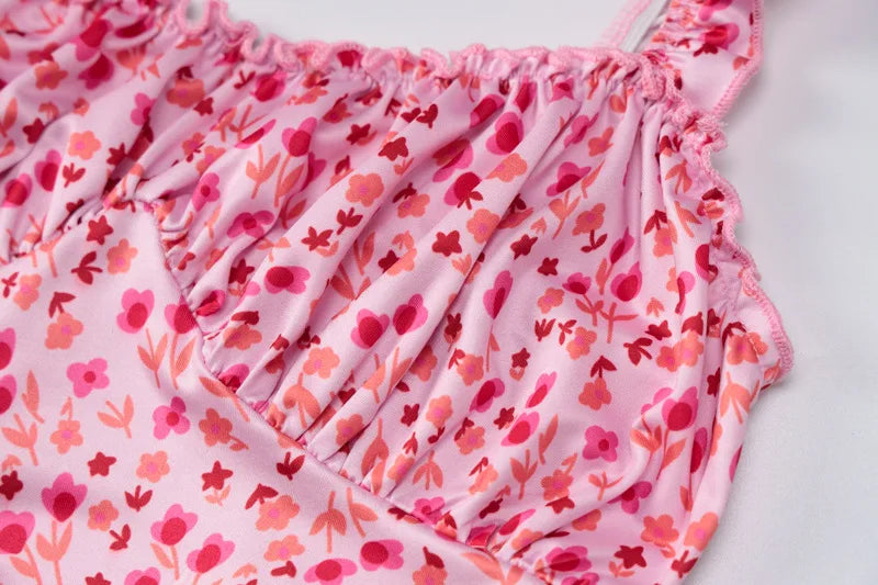 Pink floral patterned fabric on a white background