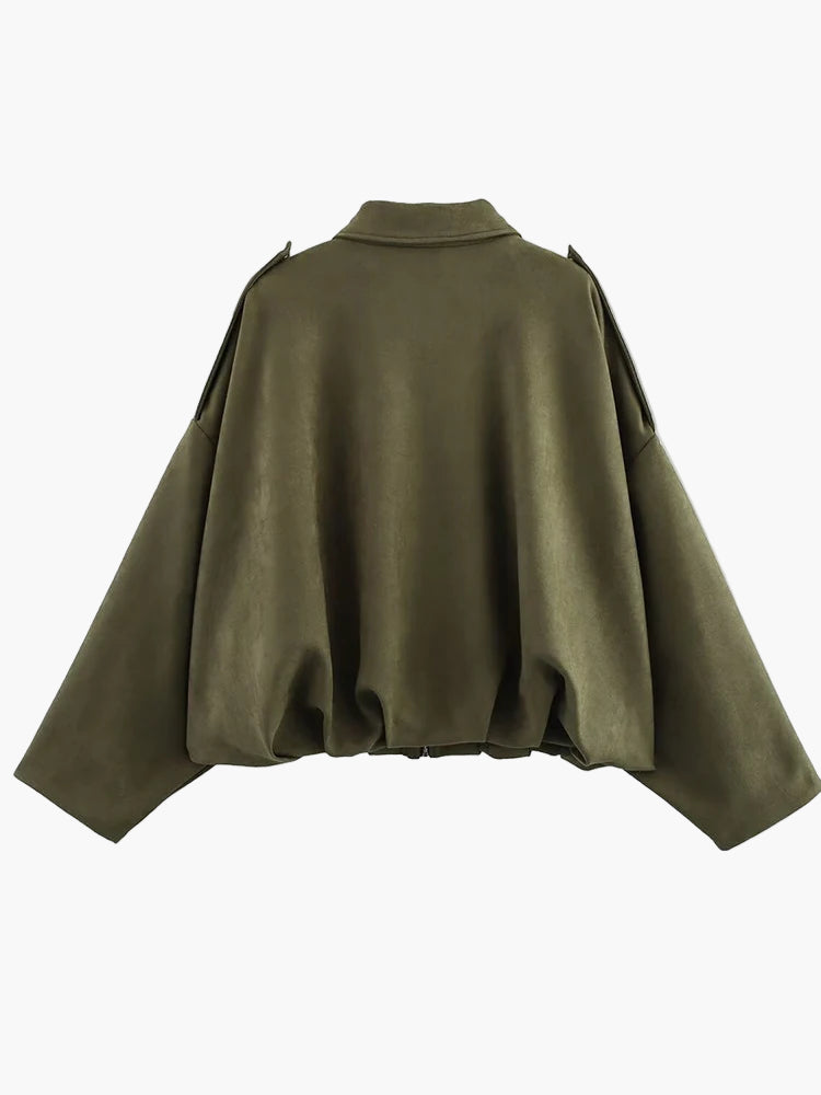 Green cape on a white background