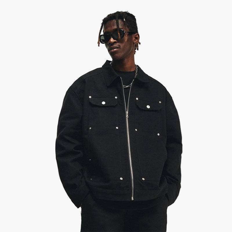 Person wearing a black jacket with silver buttons on a white background, featuring the brand 'SENSIR'.