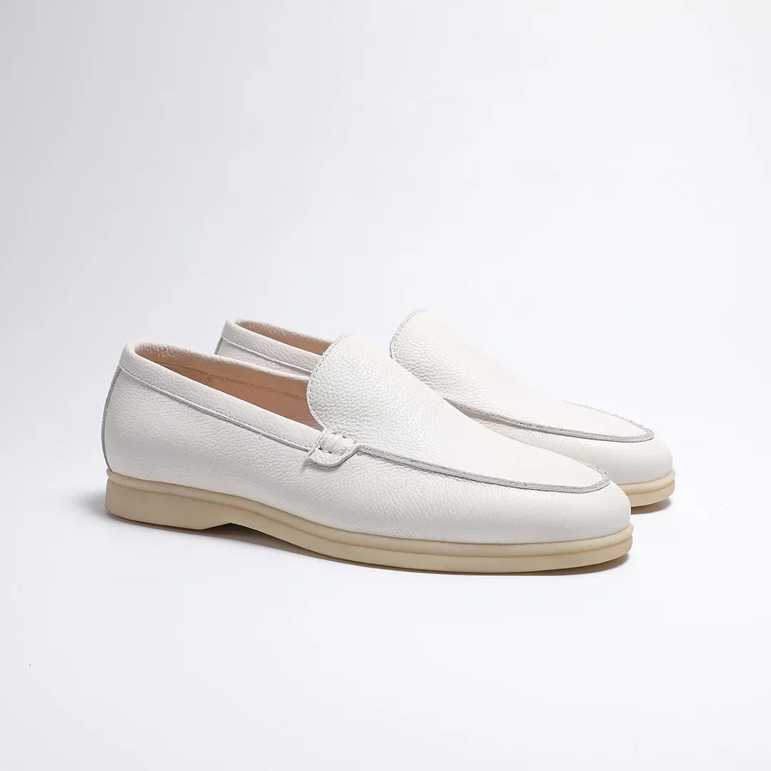 White loafers on a light gray background