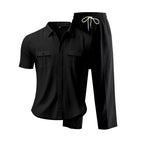 Black shirt and black pants with drawstring on a white background
