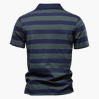 Navy and green striped polo shirt on a white background