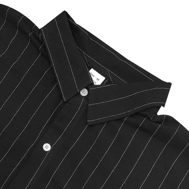 Black pinstripe shirt with collar and buttons on a white background