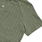 Green pinstripe shirt with a pocket on a white background