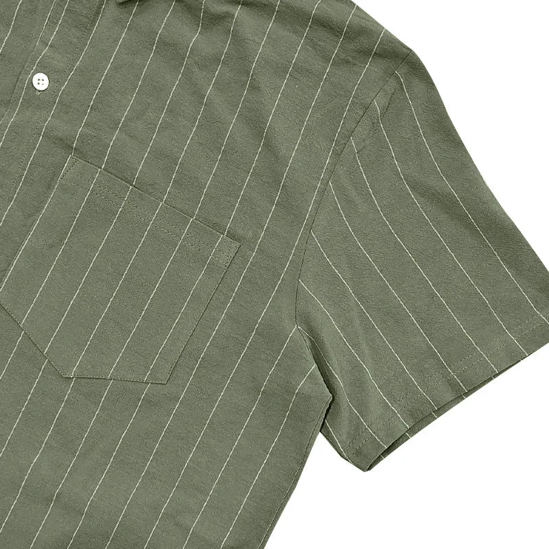 Green pinstripe shirt with a pocket on a white background