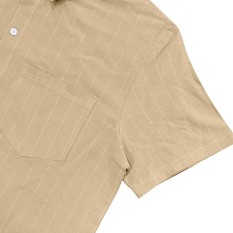 Close-up of a beige shirt with a pocket on a white background
