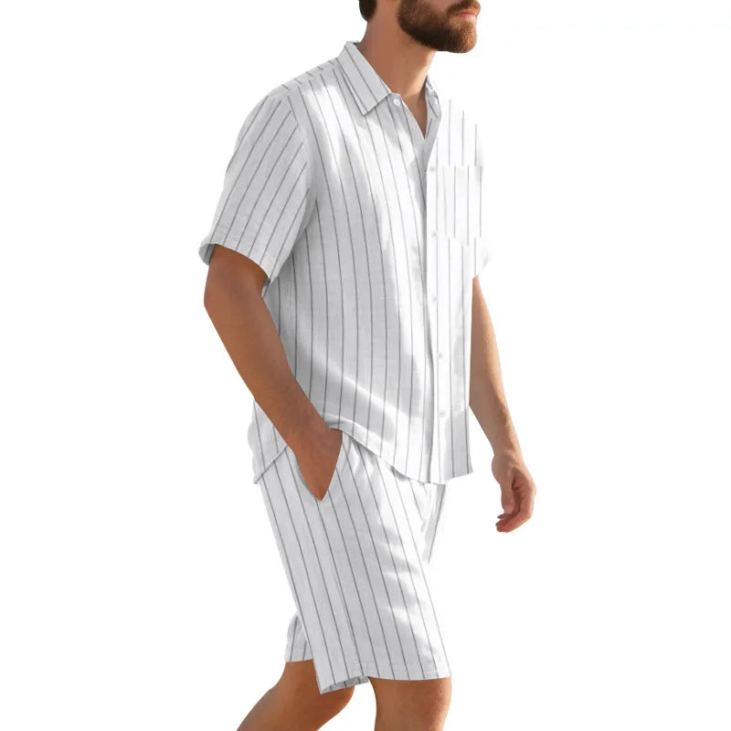 Man wearing a white and gray striped shirt and shorts on a white background