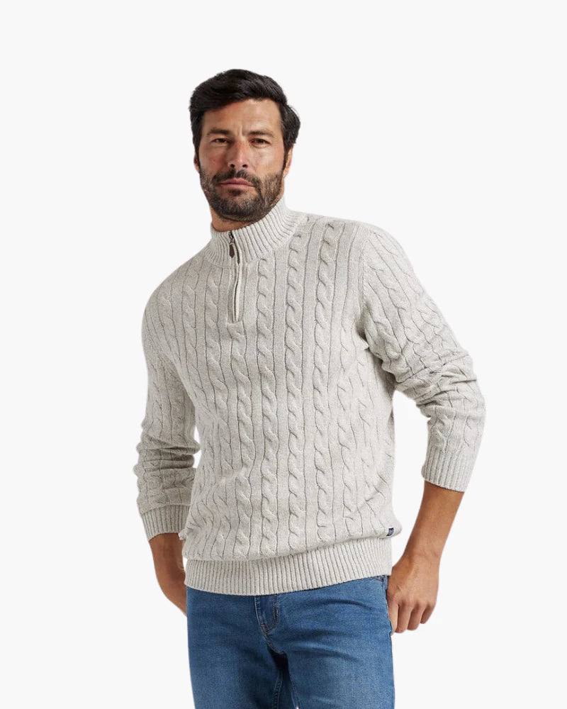 Man wearing the Altivieri cotton half-zip sweater with classic trousers.