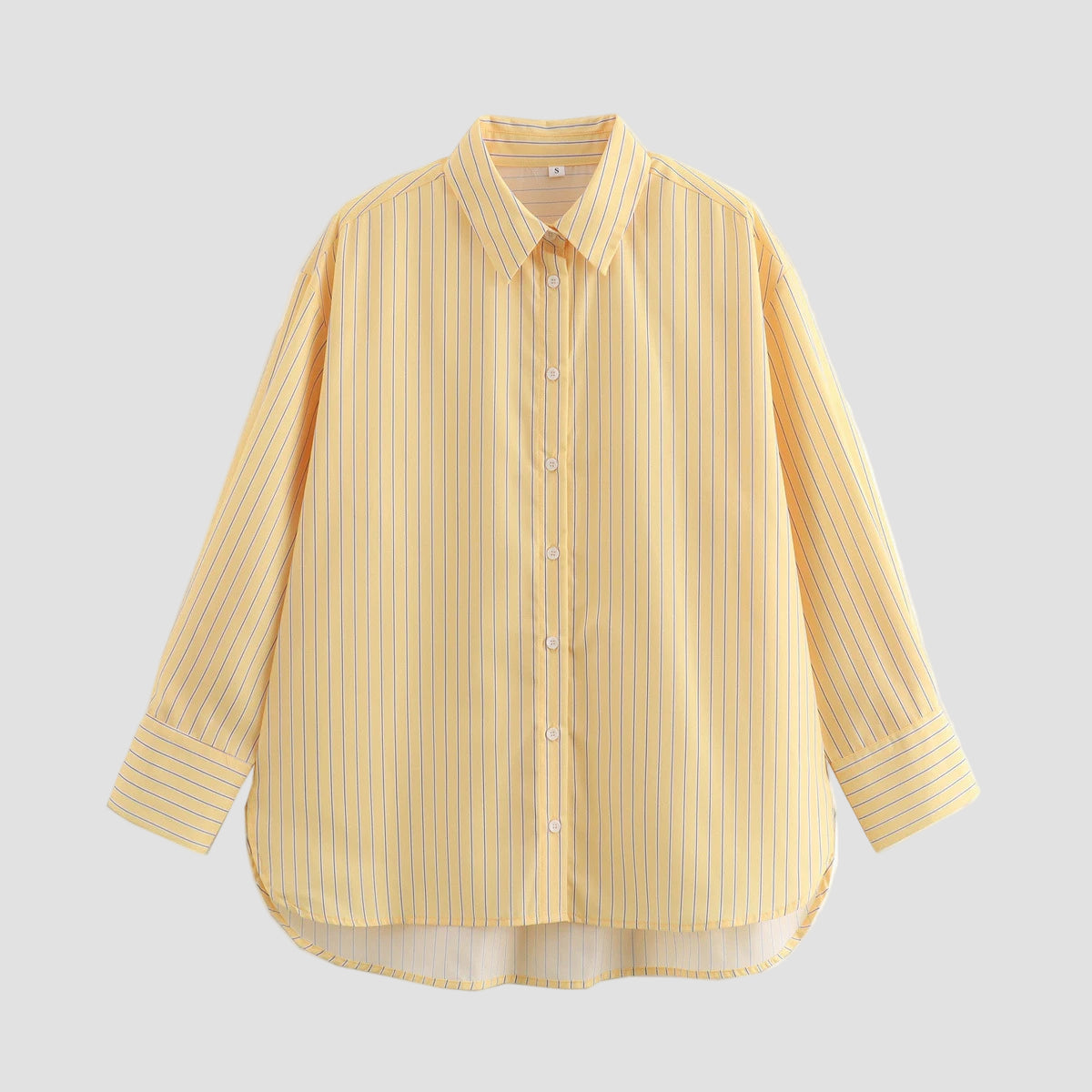 A relaxed, chic look featuring the Altivieri Capri shirt, styled half-tucked with jeans.