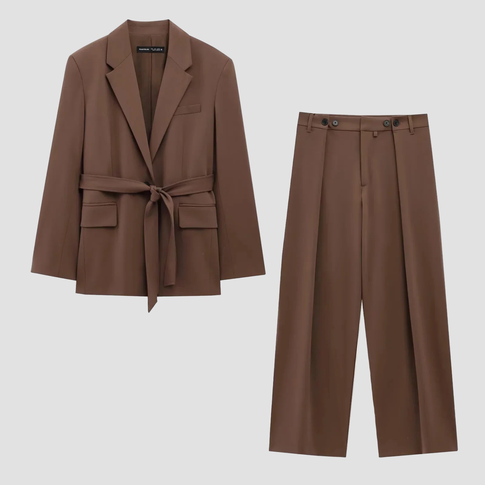 Brown suit jacket and pants on a white background