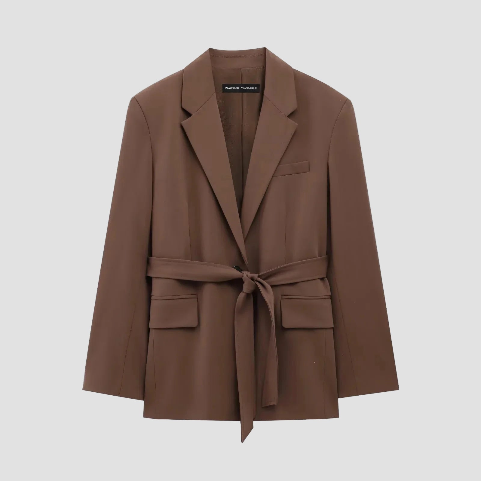 Brown blazer with a belt on a white background